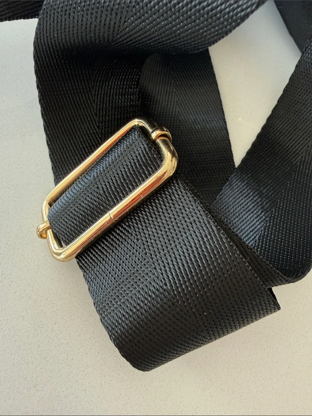 Black Nylon Backpack with Gold Zippers with slight camouflage detail